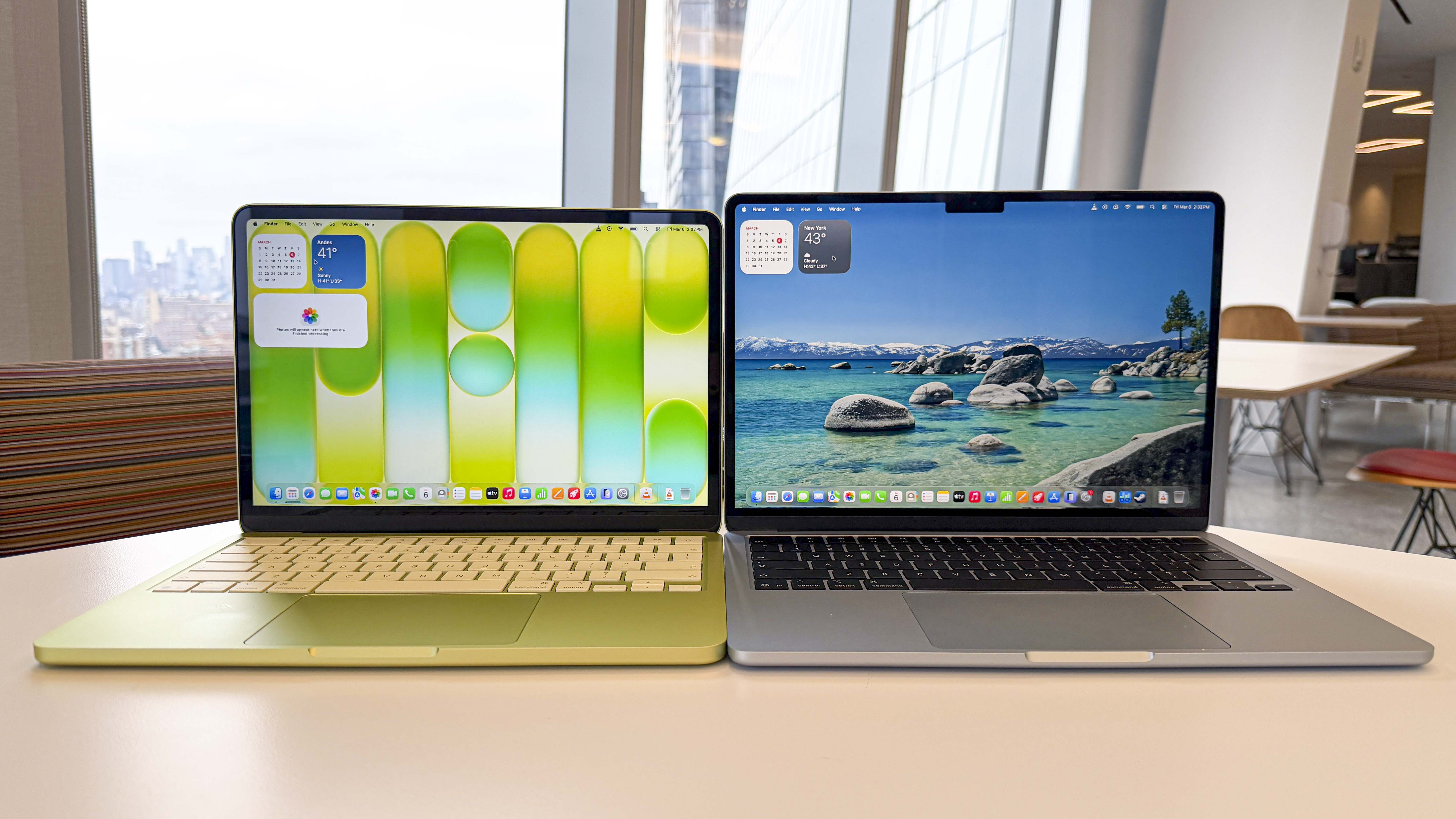 Apple MacBook Neo compared side-by-side with a MacBook Air on a wooden table