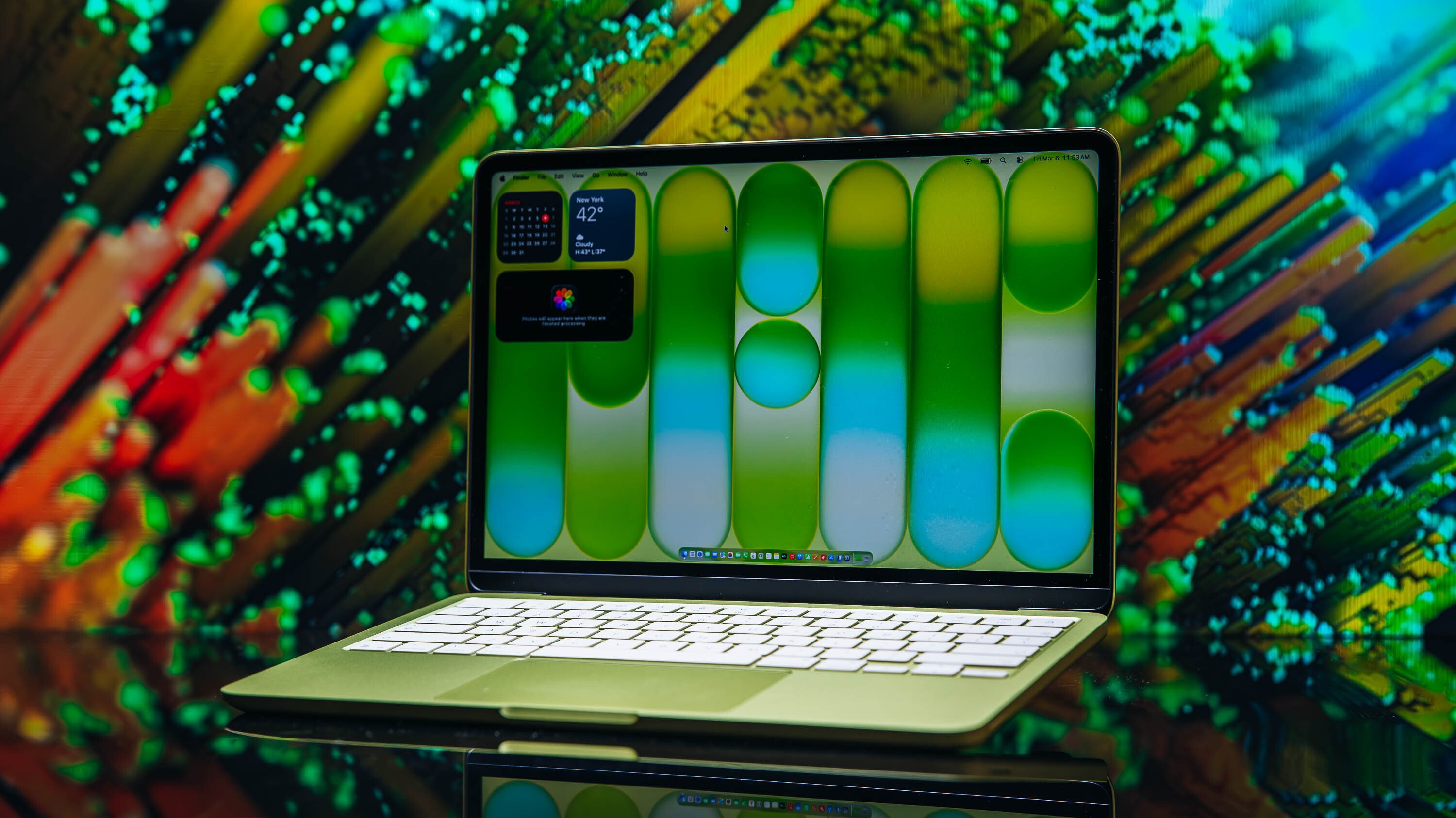 MacBook Neo displaying a colorful image showing display quality