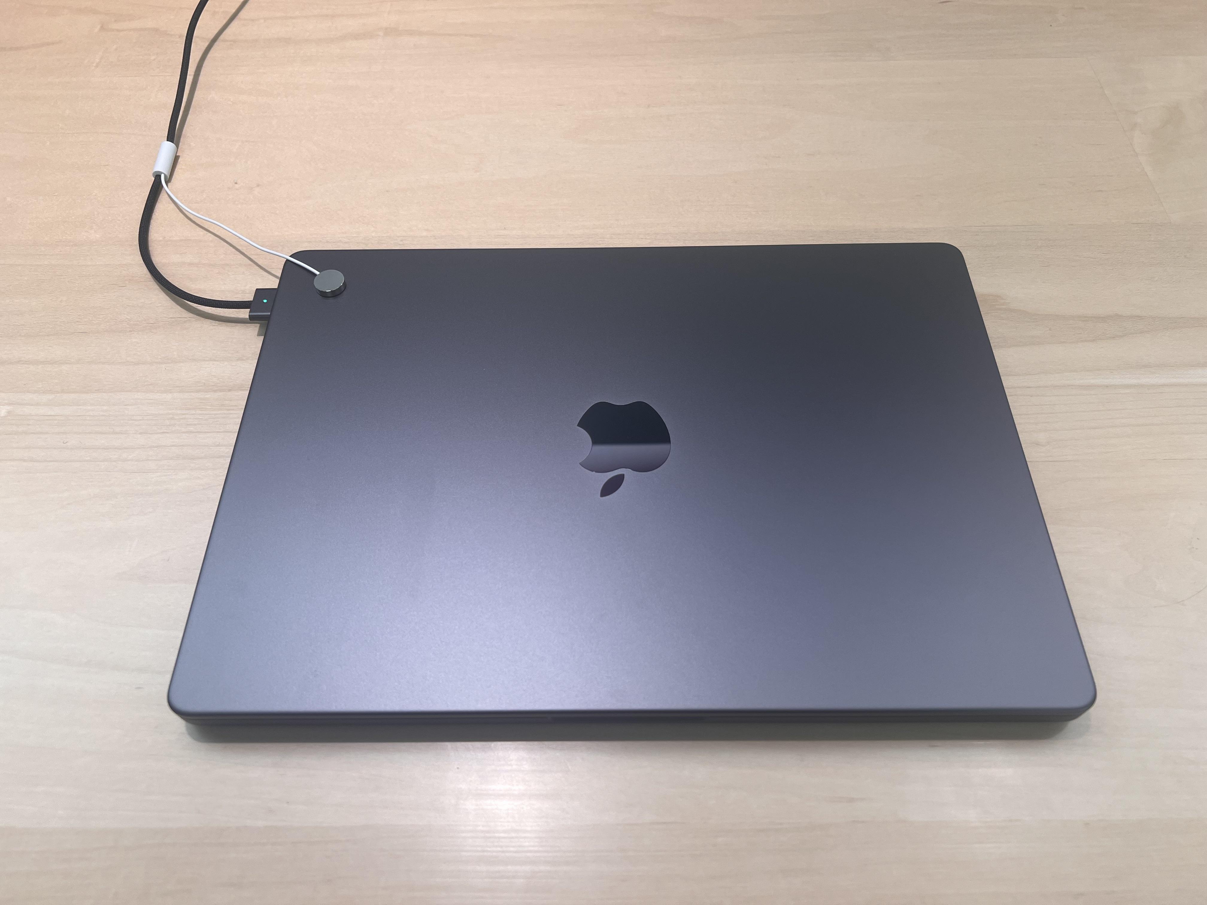 MacBook Air in Space Black color showing slim design