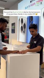 Student showing ID at Apple Retail Store for discount