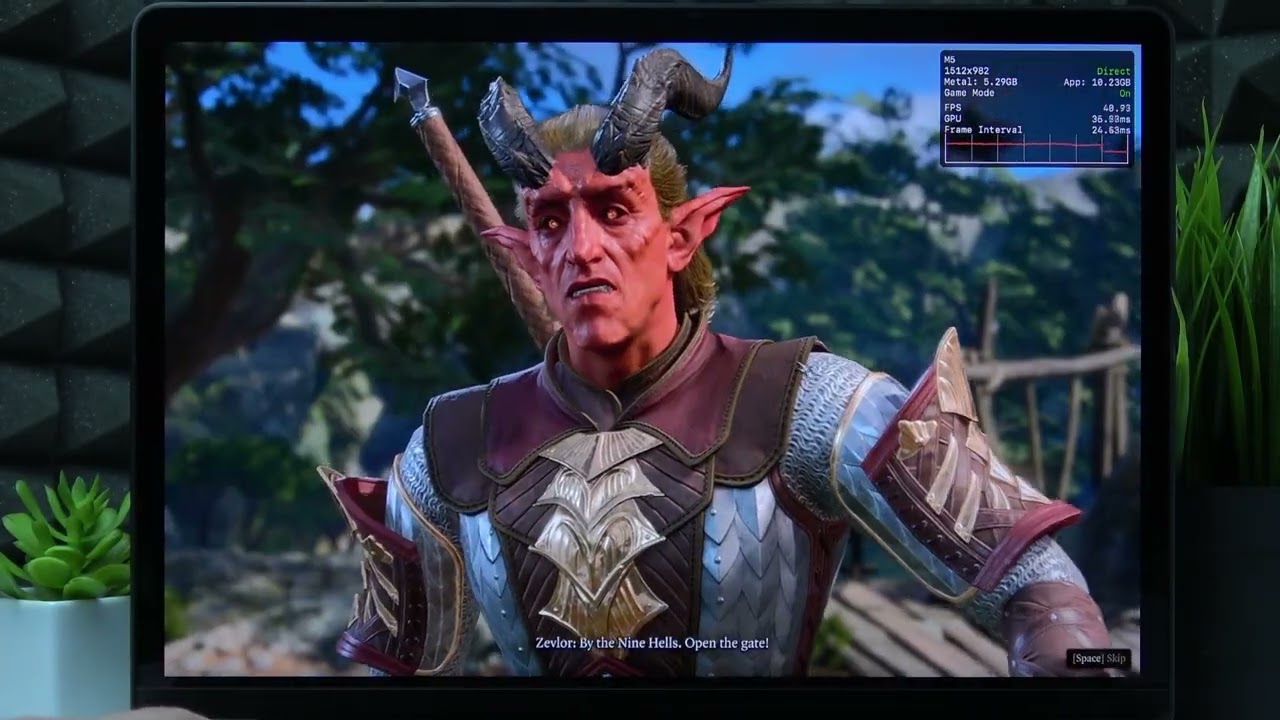 Baldur's Gate 3 gameplay on MacBook screen showing high fantasy settings