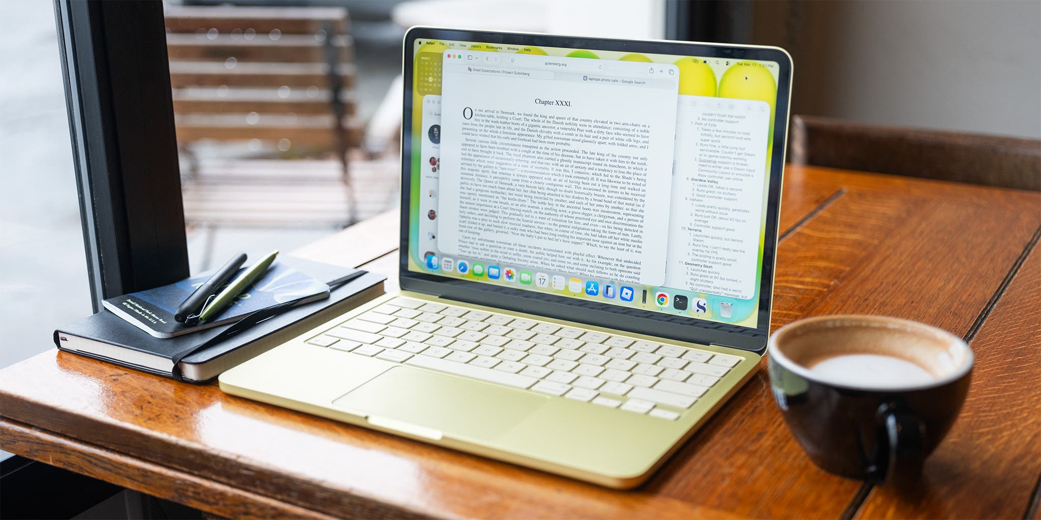 MacBook Neo surrounded by student essentials: notebook, pen, smartphone, and headphones