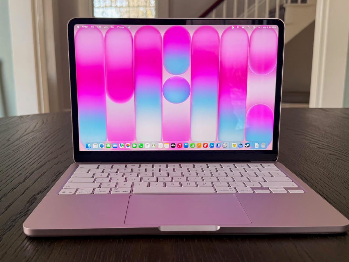 MacBook Neo laptop showing premium aluminum design and high-resolution display