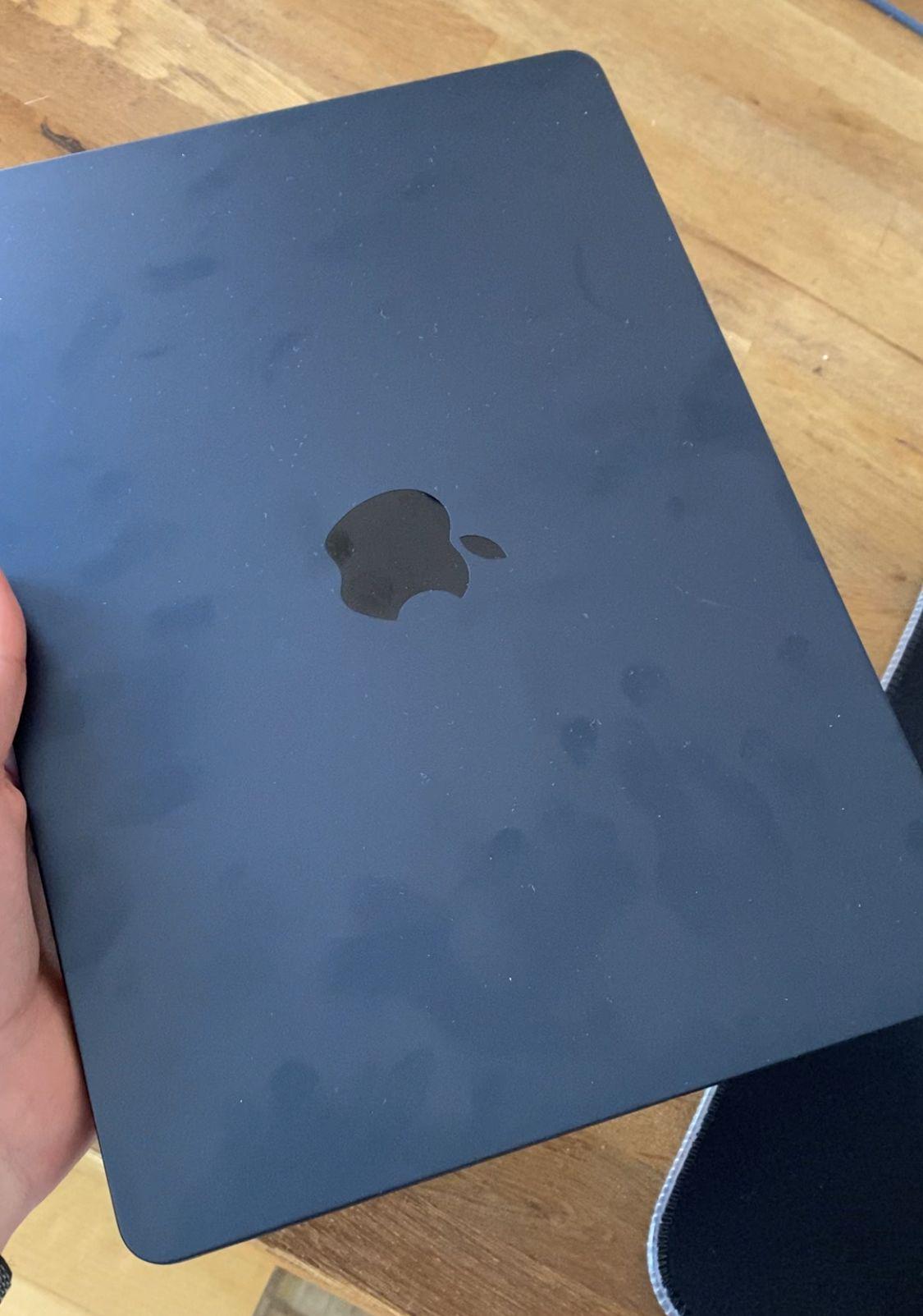 Midnight Blue MacBook Air M3 showing dark exterior