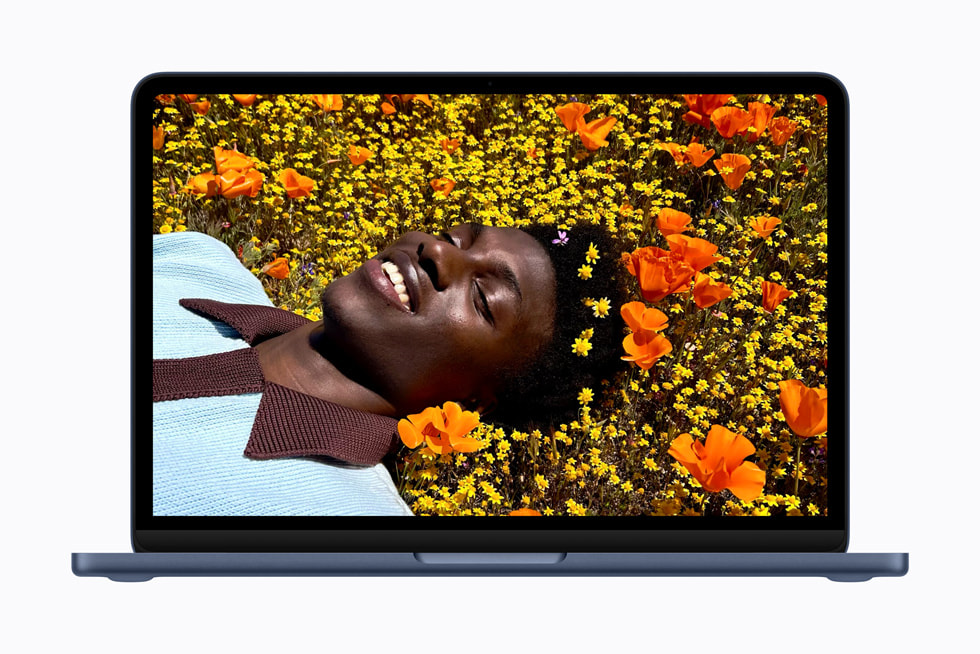 MacBook Neo 13-inch Liquid Retina display showing vibrant colors and sharp text
